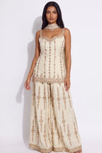 Iwan Ivory Gold Embroidered Sharara Set by Dorie Atelier – view 1