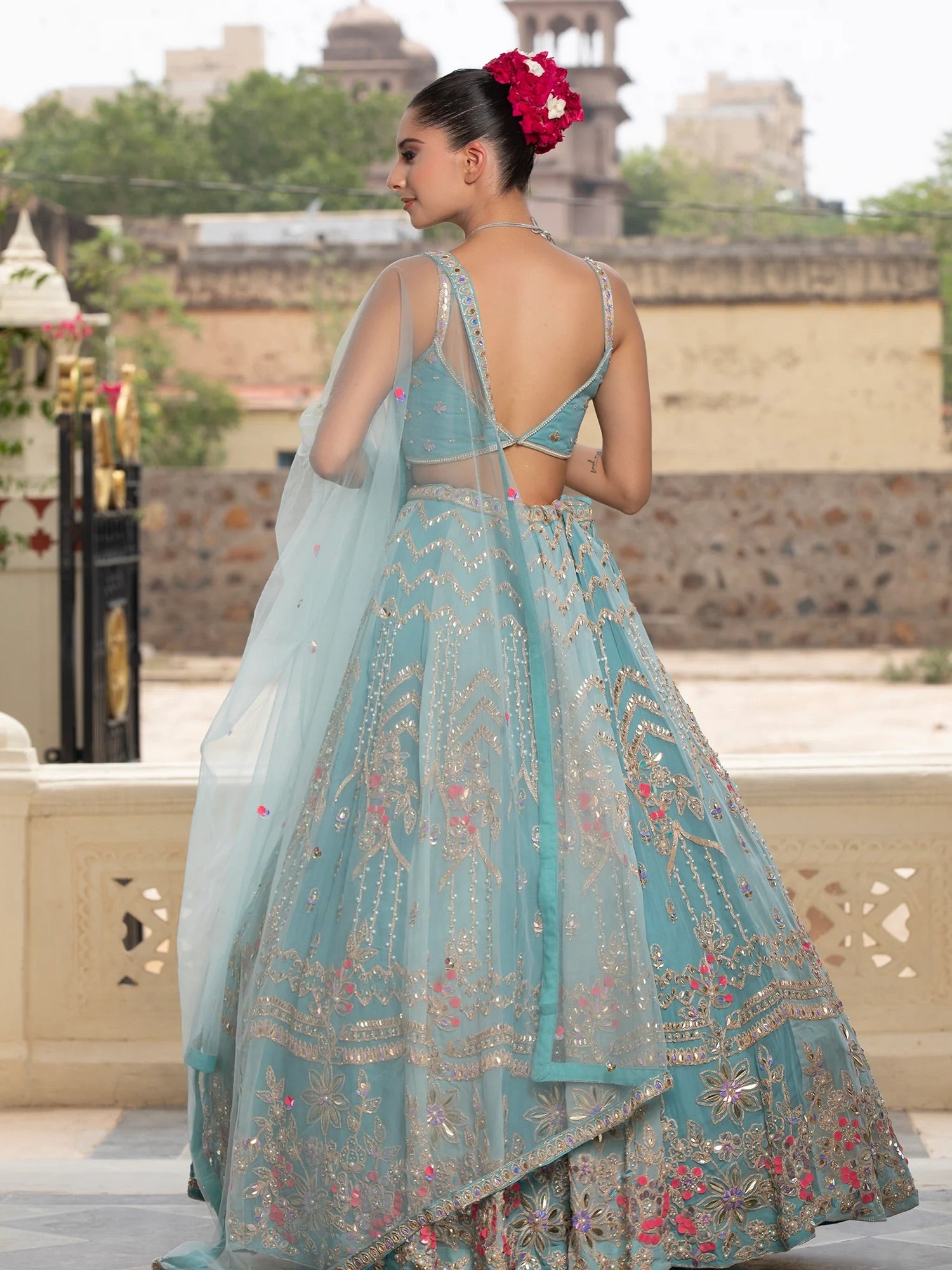 Sky Blue Net Lehenga With Handcrafted Appliqué