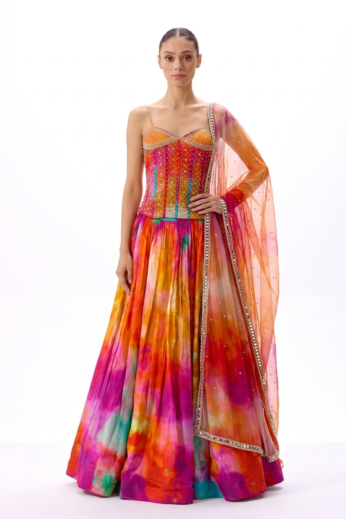 Red silk mirrorwork lehenga by Dorie Atelier, festival wear — front view