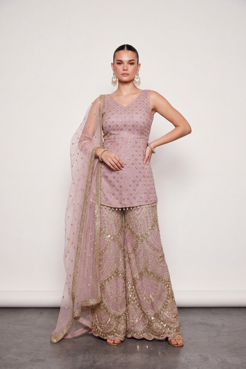 Blush net sequinned sharara set by Dorie Atelier — front view