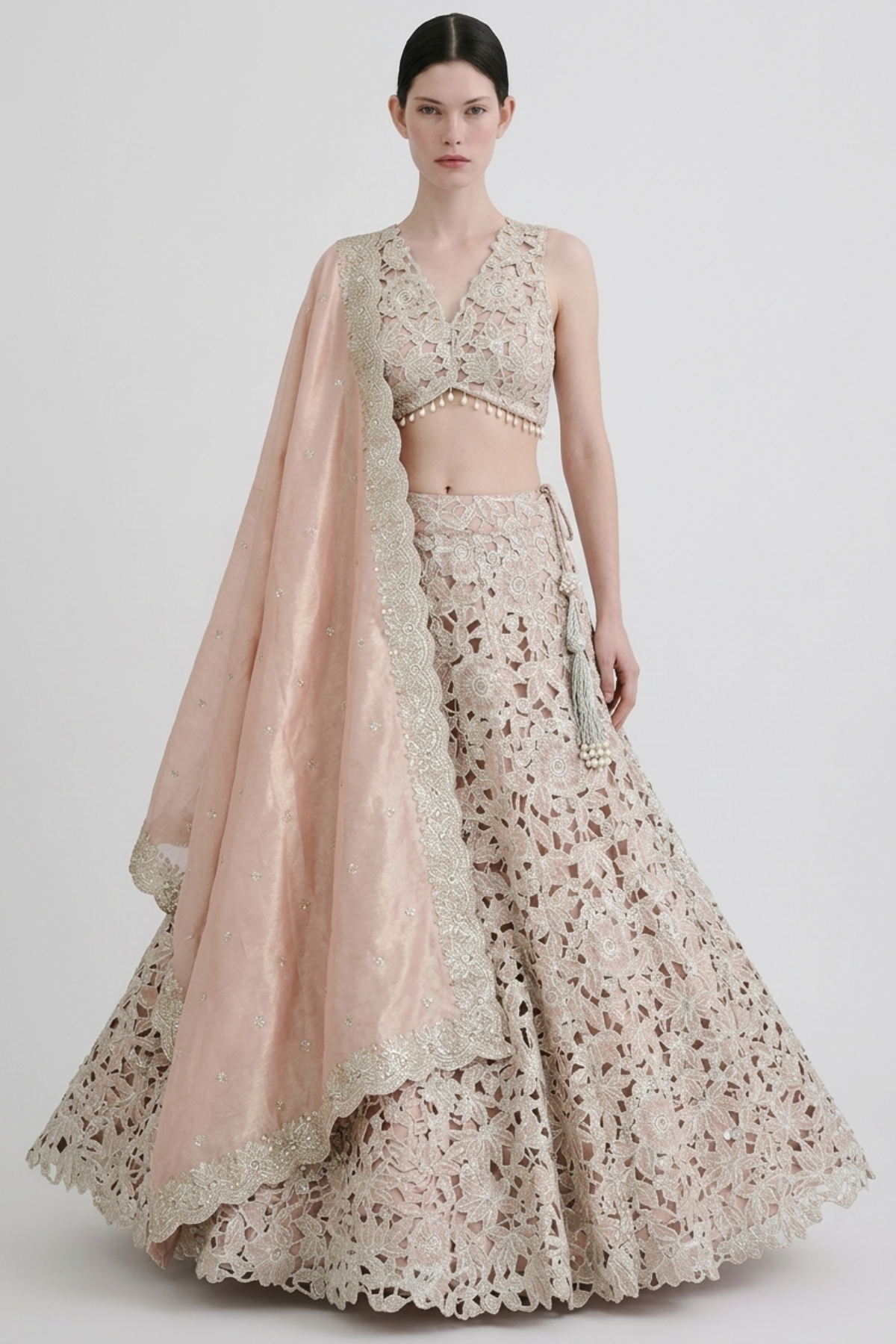Red silk zardozi lehenga by Dorie Atelier — front view