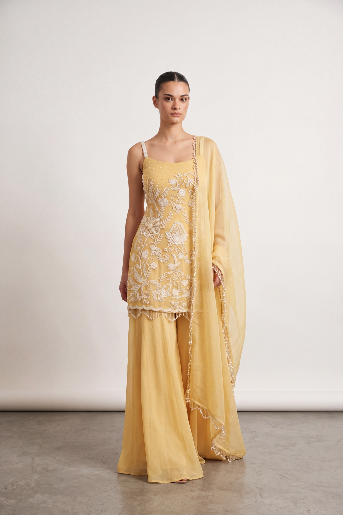 Mustard embroidered sharara set by Dorie Atelier — front view