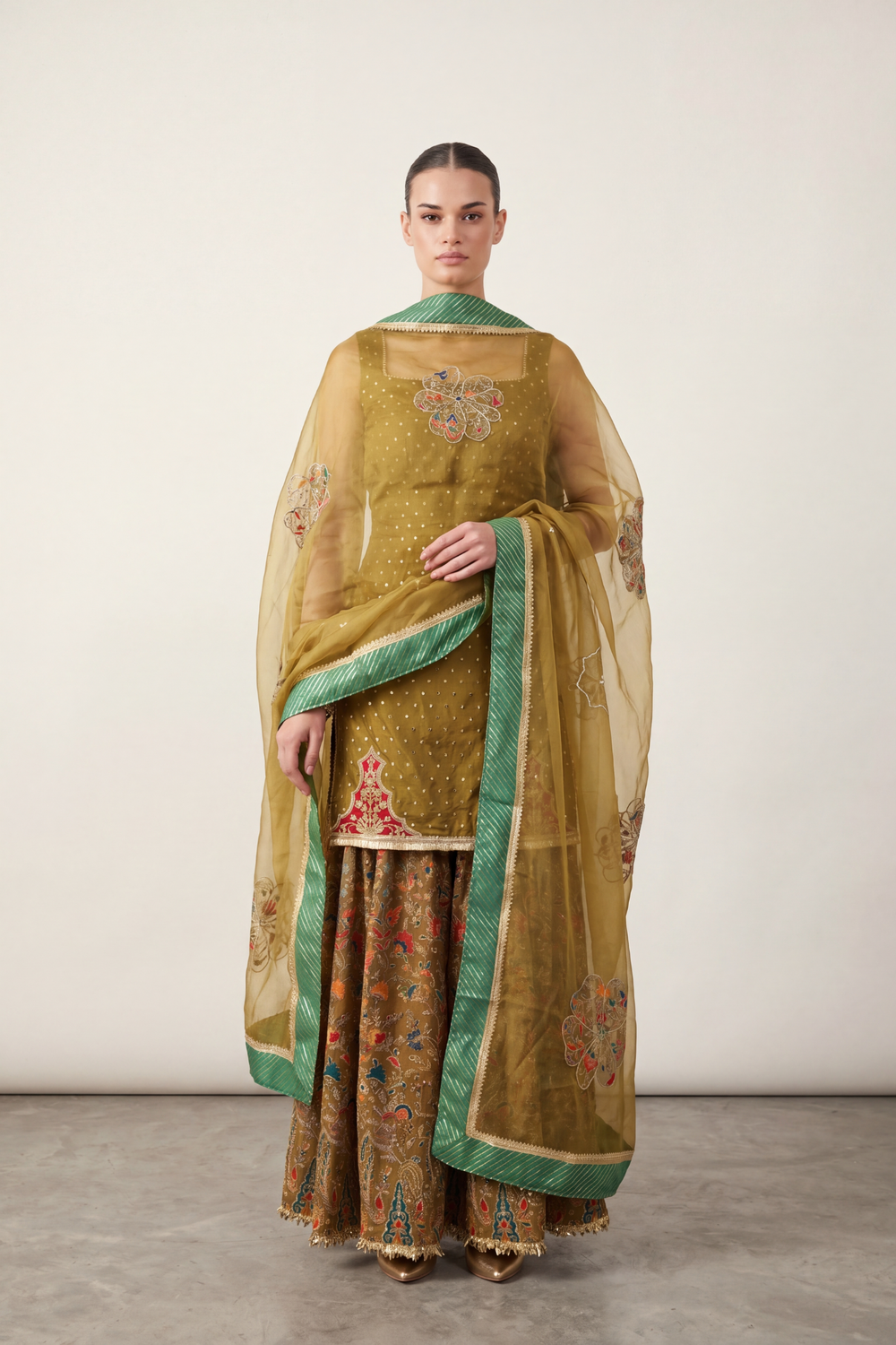 Olive appliqué sharara set by Dorie Atelier — front view