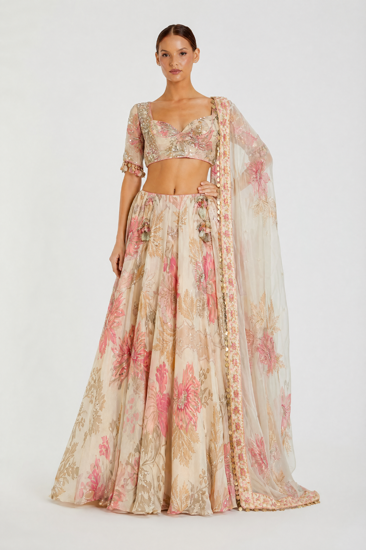 Blush pink organza embroidered lehenga by Dorie Atelier — front view