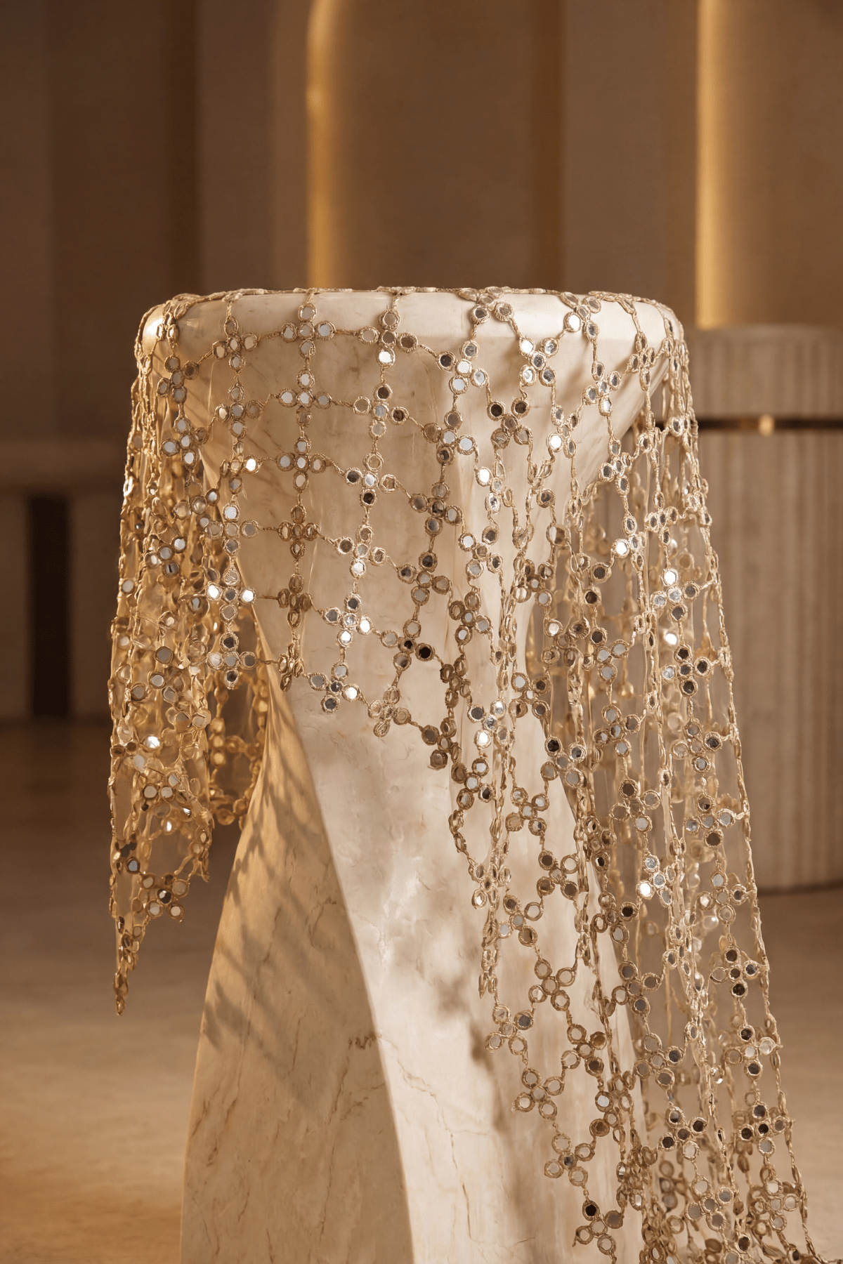 Mirror Veil Dupatta in faux mirror finish draped over a stone pedestal - Dorie Atelier