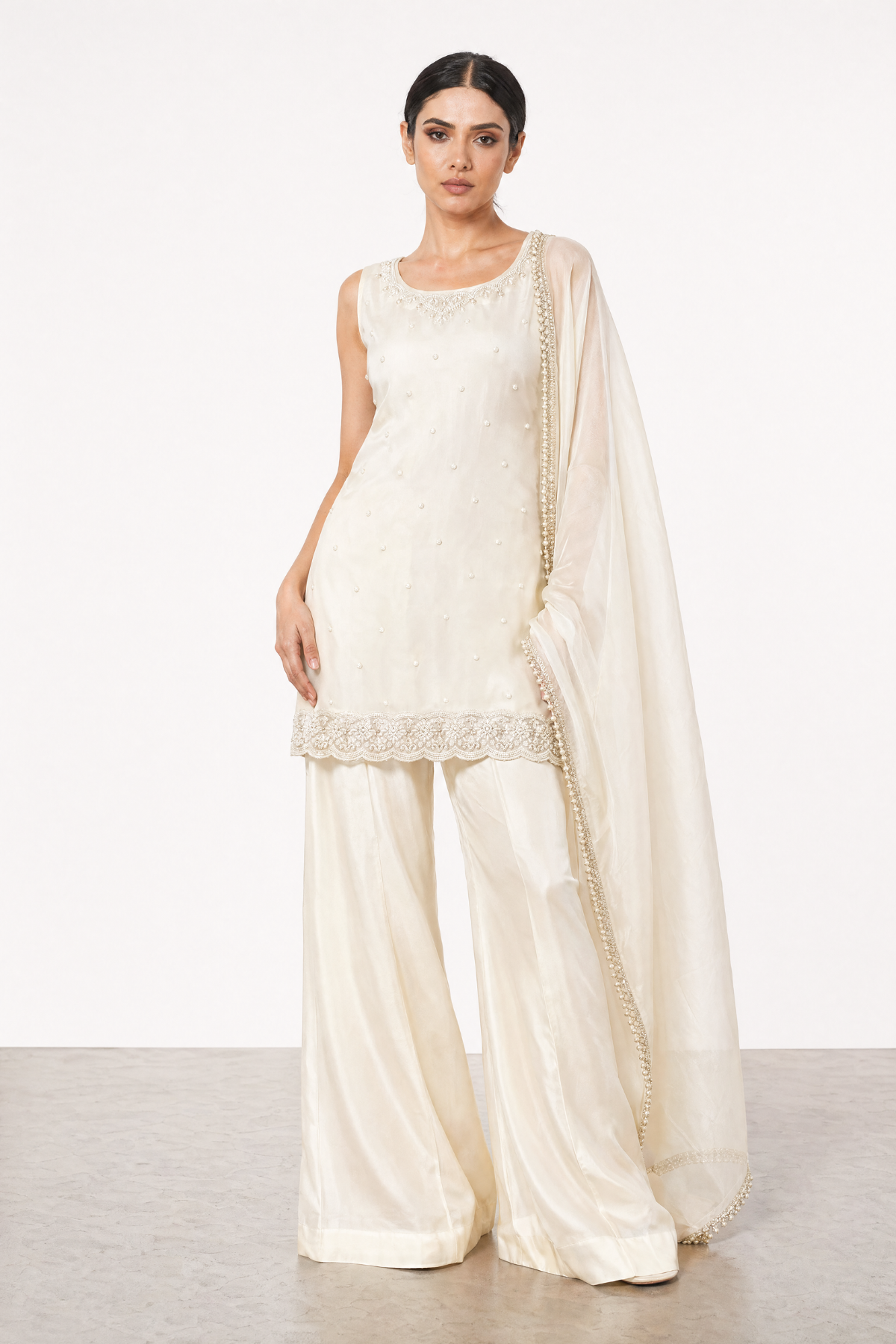 Ivory pure satin silk zari set by Dorie Atelier — front view